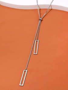 Detail of adjustable silver Y-necklace with geometric hollow rectangular pendants