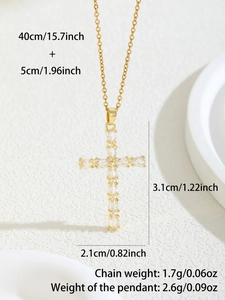 Detail showing dimensions of gold cross necklace with oval cubic zirconia stones