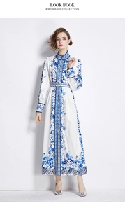 Detail of blue and white floral dress with stand collar and single-breasted buttons