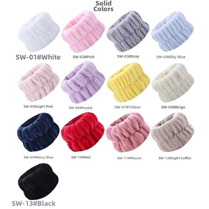 Detailed matrix view of 13 colorful microfiber spa wristbands with plush textures