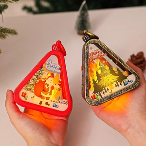 Red and bronze Christmas LED lanterns with Santa Claus illustration for holiday decor
