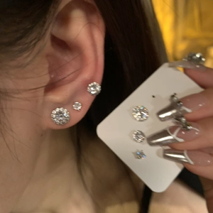 Three-piece silver cubic zirconia stud earrings set featuring round and star shapes