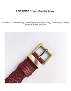 Detail of red braided belt with a gold-finished alloy buckle and electroplated coating