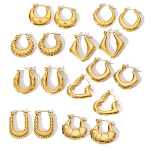 Set of nine assorted 18K gold plated stainless steel hoop earrings in various textures