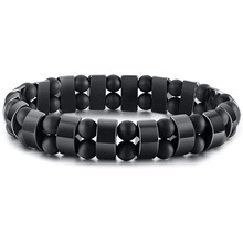 Detail of double-layer beaded bracelet featuring matte round beads and polished rectangles