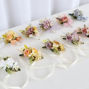 Vintage oil painting style wedding corsages and wrist flowers in multiple colors
