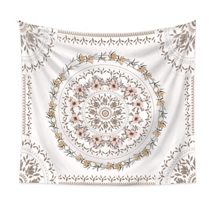 Close-up of mandala flower pattern on bohemian tapestry in beige and brown tones
