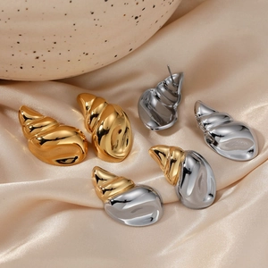 Three pairs of polished stainless steel conch earrings in gold and silver finish