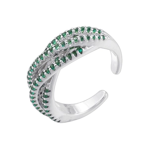 Detailed macro view of silver crossover ring featuring pavé set green zircons