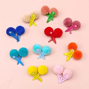 Set of 10 pairs colorful plush ball hair clips for kids on pink background