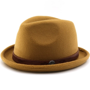 Close-up of ginger wool fedora hat with embossed brown leather band and silver buckle