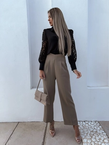 Close-up of black lace-spliced shirt texture and stylish office lady outfit details