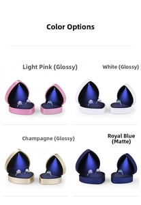 Macro view of heart-shaped LED jewelry boxes in glossy and matte finishes