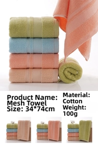 Detail of 100% cotton grid towels showing soft texture in green, blue, and orange colors