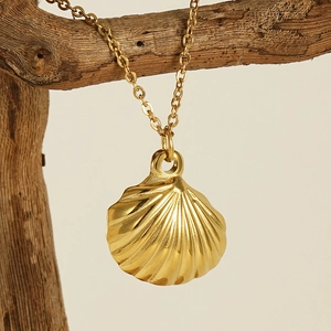 Elegant 18K gold plated stainless steel fan-shaped shell pendant necklace on wood