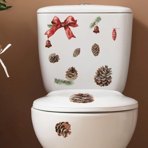 Christmas toilet lid sticker featuring red bow pine cones and bells home bathroom decor
