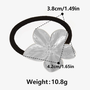 Detail view of a 304 stainless steel flower hair tie with size and weight annotations