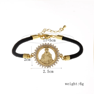Detailed view of adjustable Milan rope bracelet with sun ray zircon Virgin Mary charm