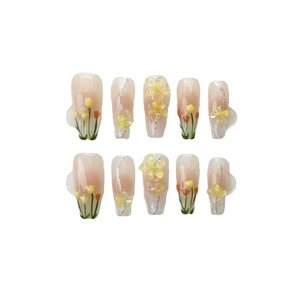 Handmade press-on nails featuring hand-painted tulips and 3D floral accents