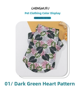 Detail of breathable dog summer shirt featuring tropical green and purple leaf prints