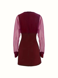 Detailed back view of wine red dress featuring mesh sleeves and invisible zipper closure