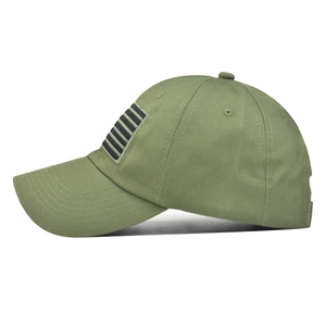 Side view of olive green washed cotton baseball cap with American flag patch detail
