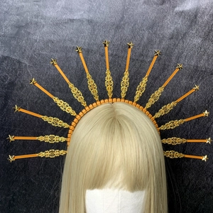 Golden sunburst crown headband with star details and halo spikes for goddess costume