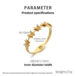 Macro detail of golden butterfly stainless steel bracelet with matte brushed finish and clasp
