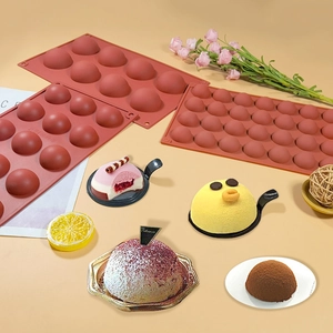 Brick red silicone semi-sphere molds in 6, 15, and 24 cavity sizes for baking desserts