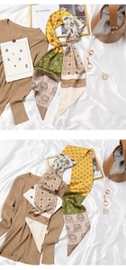 Flat lay of french style floral silk scarf with mixed geometric patterns on satin