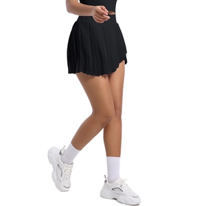 Dynamic side view of a black pleated tennis skirt with quick-dry fabric and pockets