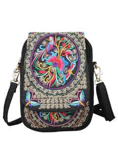 Detailed close-up of vibrant floral embroidery on a black ethnic crossbody phone bag