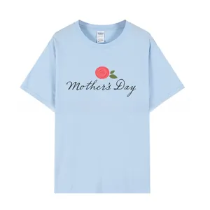 Detailed view of Mother's Day Brunch floral print on a light blue cotton T-shirt