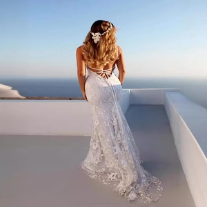 Elegant white lace mermaid evening dress with backless lace-up detail and long train