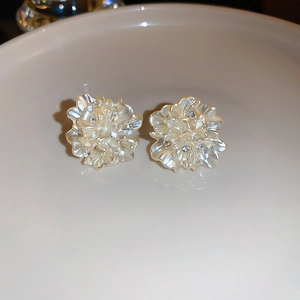 Elegant pearlescent resin flower earrings with sparkling crystals and gold plating