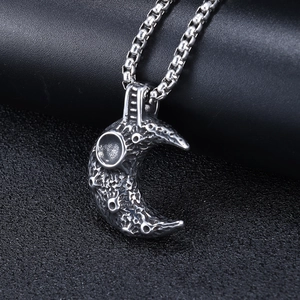 Retro stainless steel moon crater pendant necklace with vintage texture on black leather