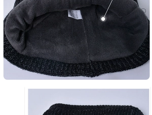 Detail view of winter knit beanie with thick grey fleece lining for extra warmth