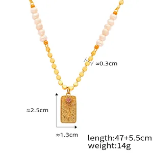 Detailed view of pearl and gold bead chain with a rose embossed gemstone pendant necklace