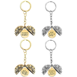 Set of 4 metallic sunflower keychains with inspirational engraved quotes in gold and silver