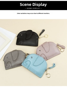 Detail of cute leather elephant coin purses with golden zippers and stylish tassels