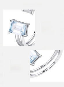 Detailed macro view of S925 sterling silver ring with aquamarine zircon and four-claw setting