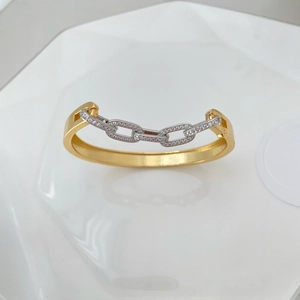 Elegant two-tone geometric open bangle with pavé zircon chain detail on white background