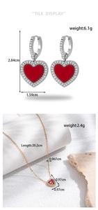 Detail display of red heart earrings and necklace with weight and size specifications