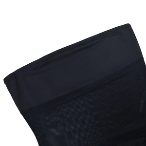 Close-up of the breathable mesh stitching and elastic fabric on a black dress