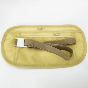 Detailed view of beige anti-theft waist bag with dual zippers and adjustable buckle