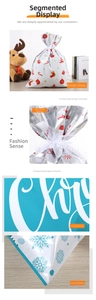 Détail du sac cadeau de Noël avec motifs festifs et fermeture à ruban satiné
