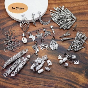 107pcs silver dreadlock jewelry set with various charms on dark wood background