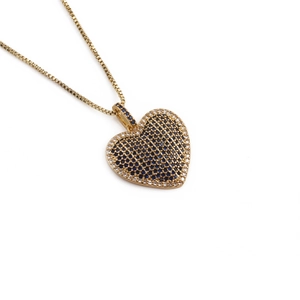 Golden box chain necklace with a heart pendant featuring blue and white zircon stones