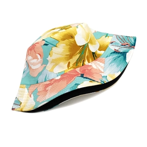 Detailed view of floral print bucket hat stitching and reversible black inner lining