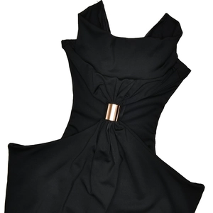 Detail of black halter dress featuring a metal buckle and elegant pleated chest design